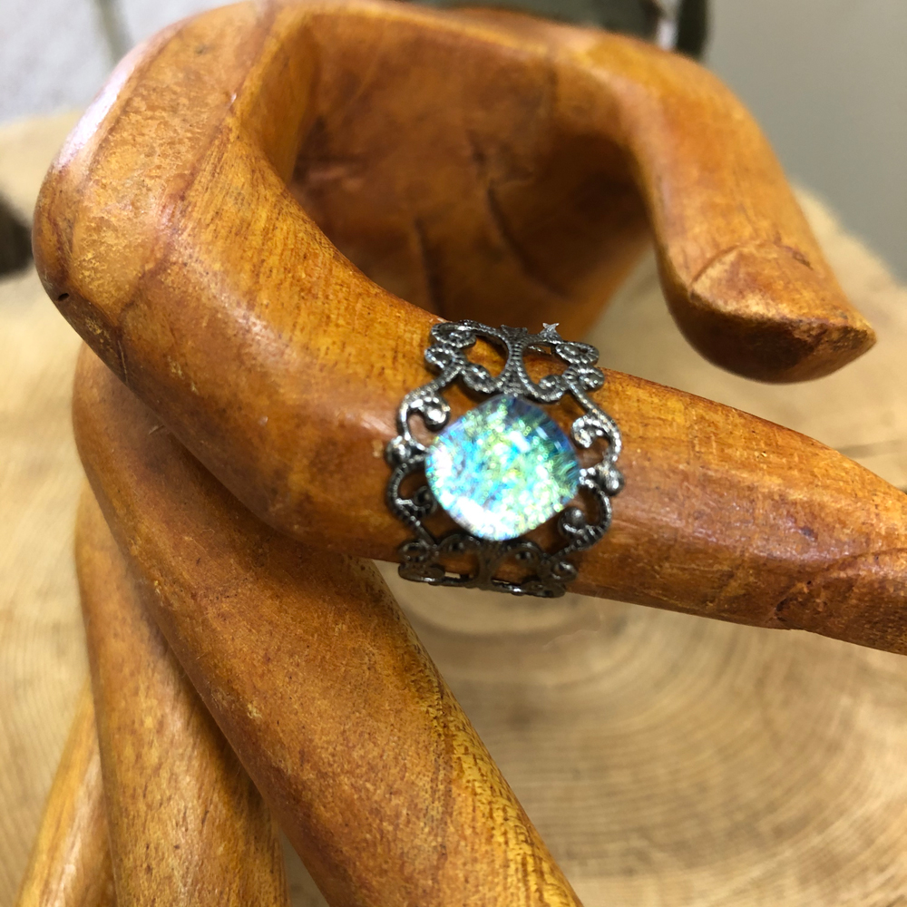 Gunmetal Plated Adjustable Filigree Ring with a Dichroic Accent