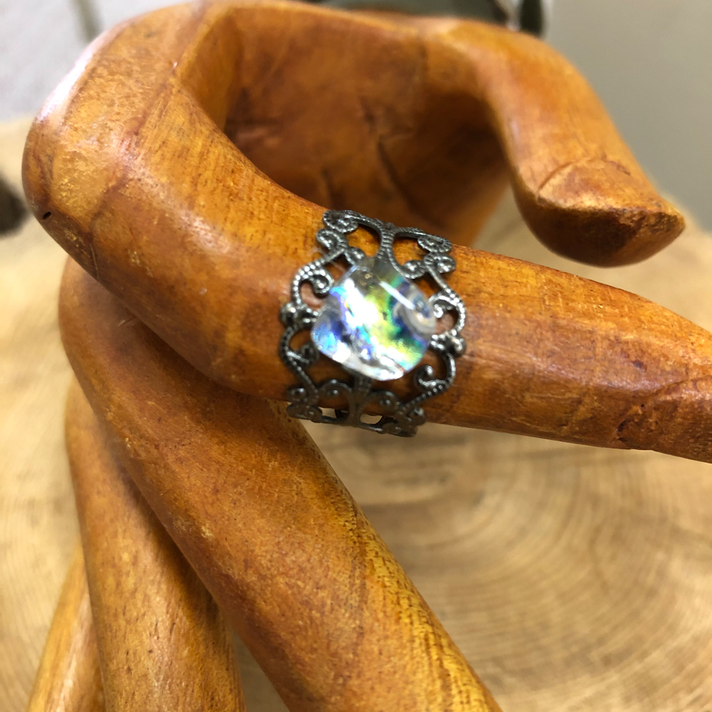 Gunmetal Plated Adjustable Filigree Ring with a Dichroic Accent