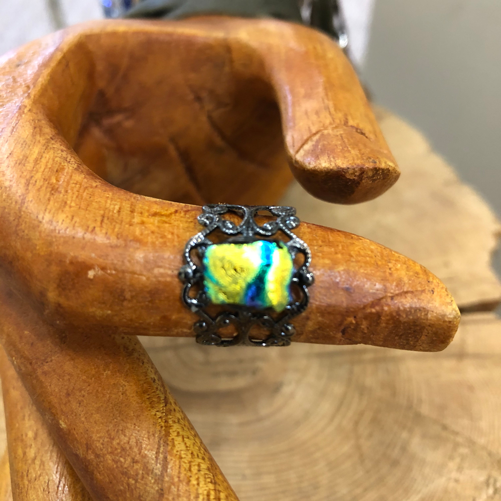Gunmetal Plated Adjustable Filigree Ring with a Dichroic Accent